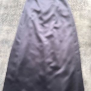 Nicole Miller A line long skirt. Lined. Gunmetal grey. Inverted pleat in back.